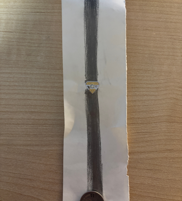 A graphite circuit with LED components.