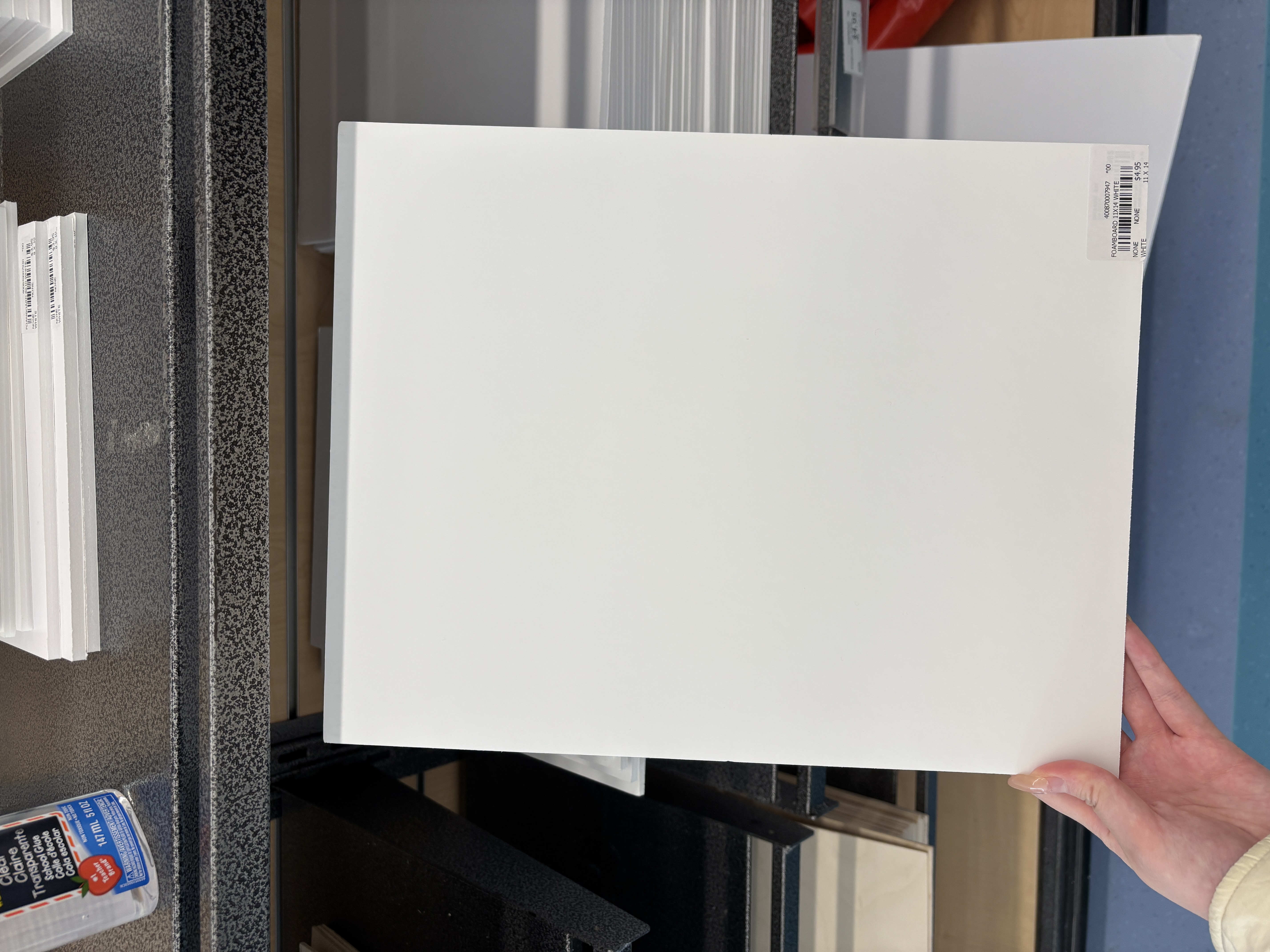 Foam board that makes a light tapping sound when moved or touched.