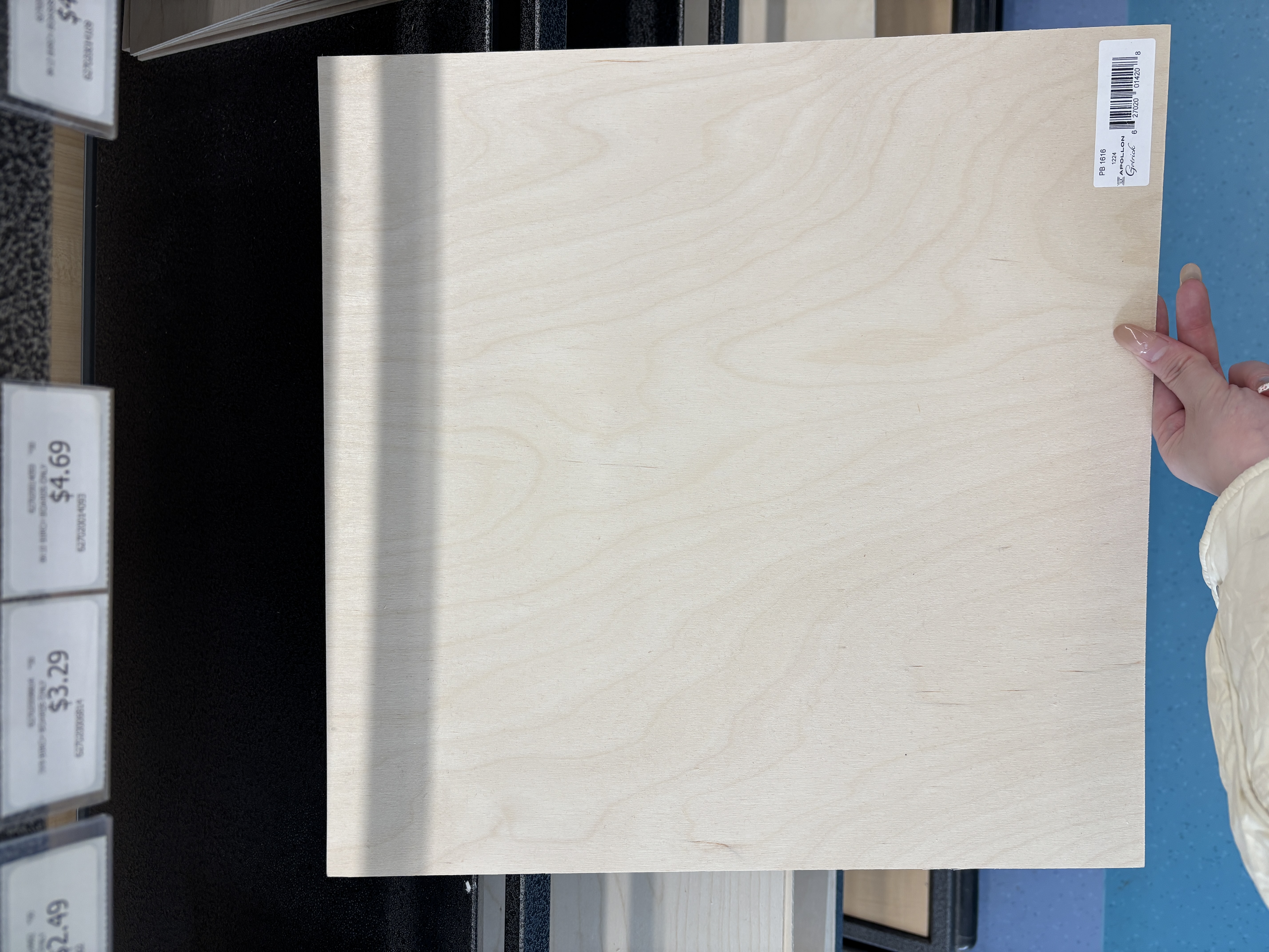 Birch board that makes a light thud when tapped or moved.