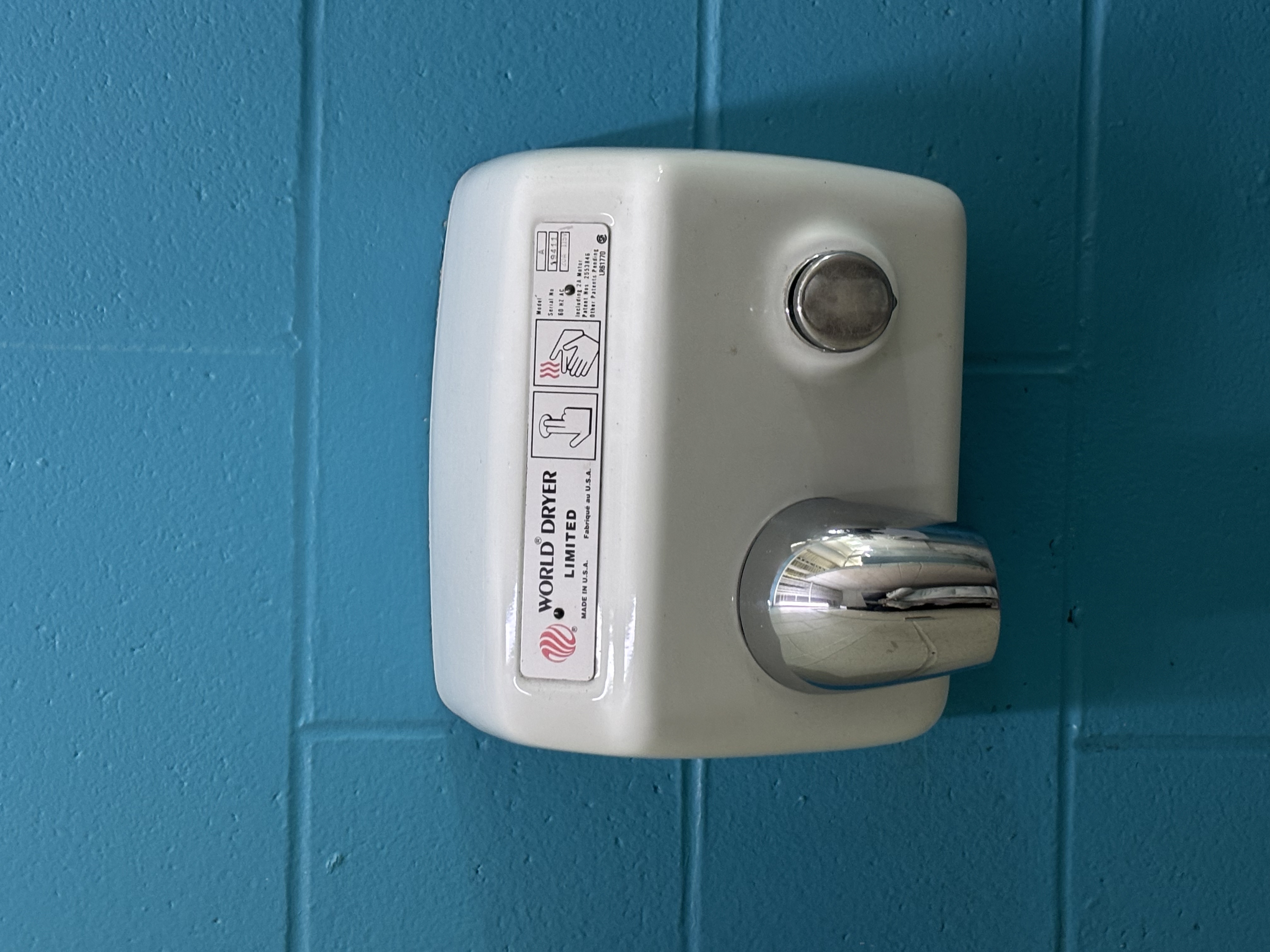 Hand dryer that makes a loud blowing sound when activated.