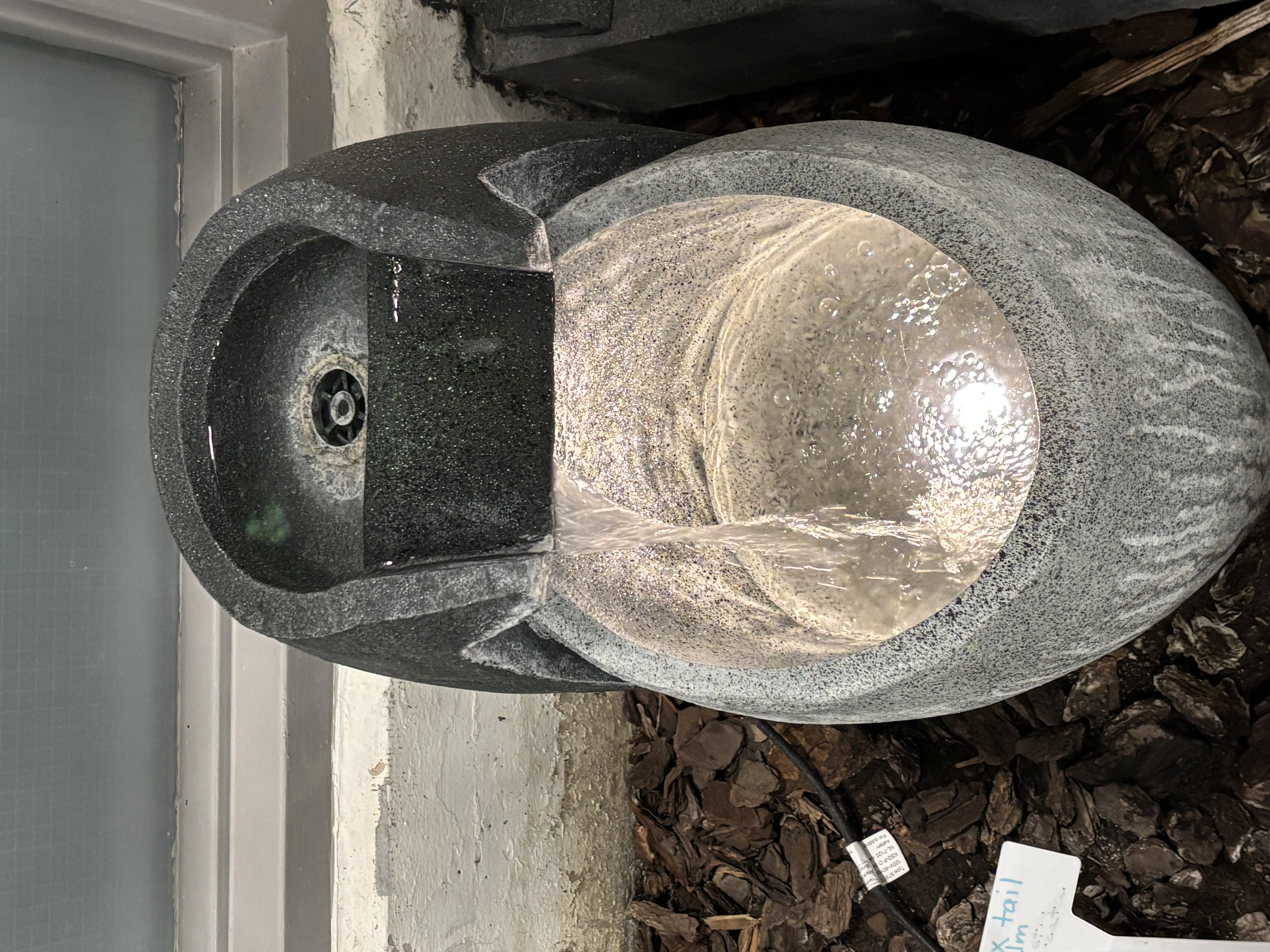 Library water feature that produces a gentle gurgling sound as the water flows.