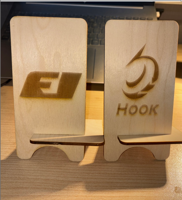 Photo shows the combined front view of the final F1 racing official logo style and F1 racing official logo style phone stand.